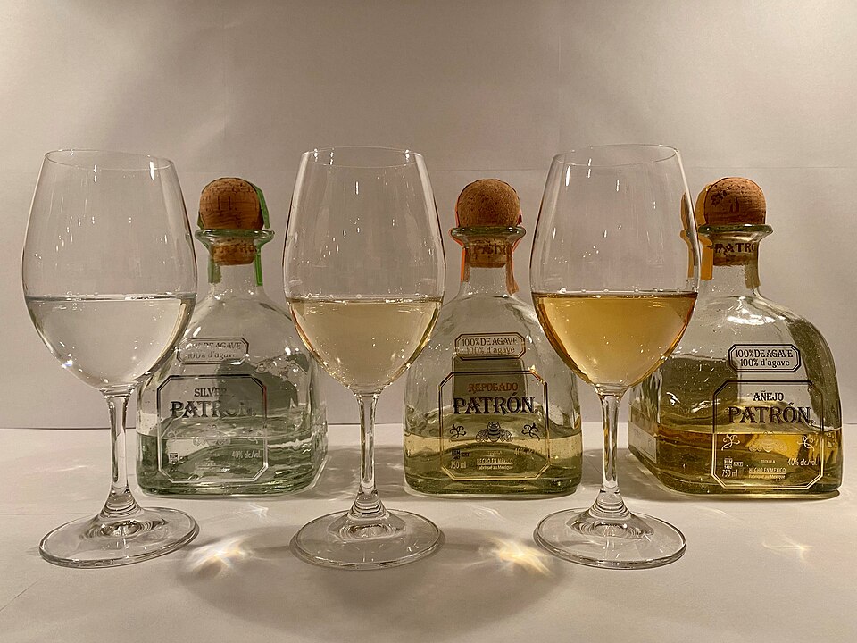 Real photograph of Patron Tequila Silver, Reposado and Anejo bottles
